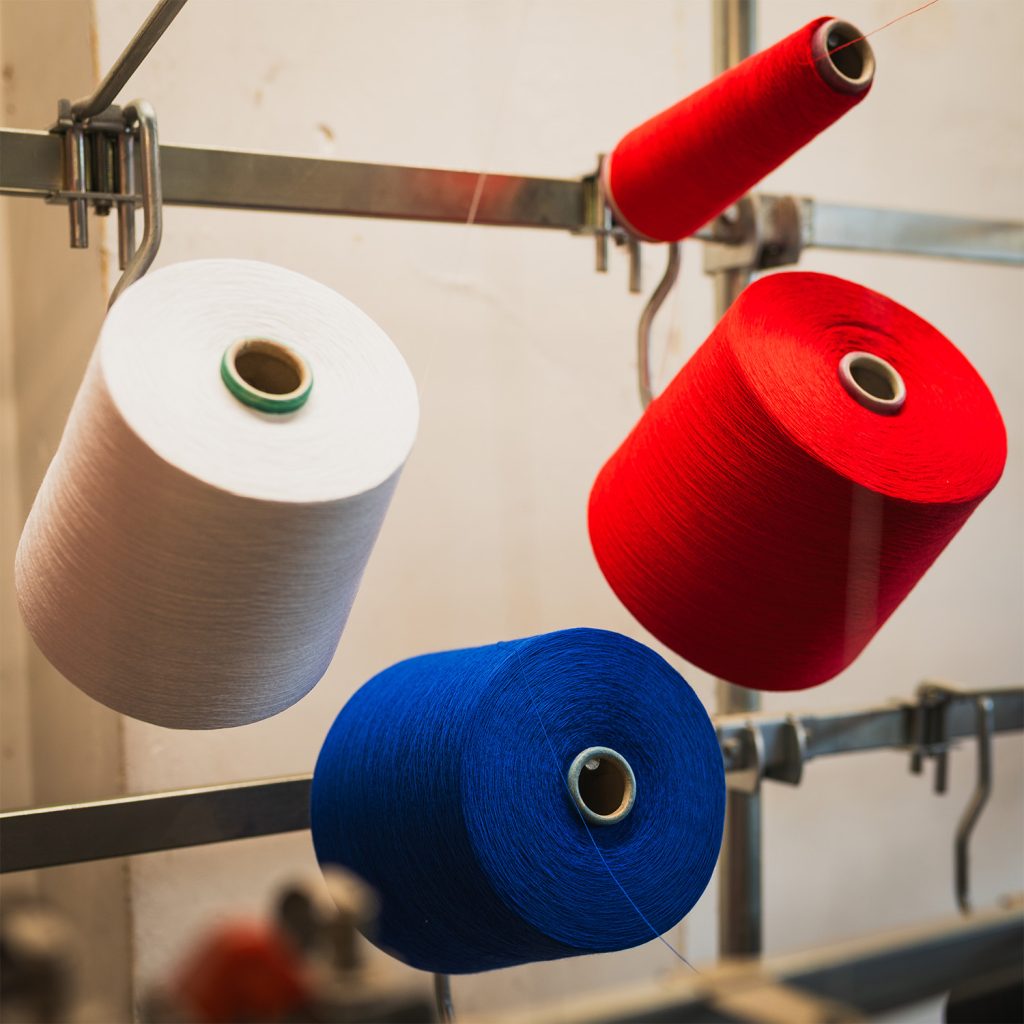 Embroidery thread cones for bespoke branded workwear